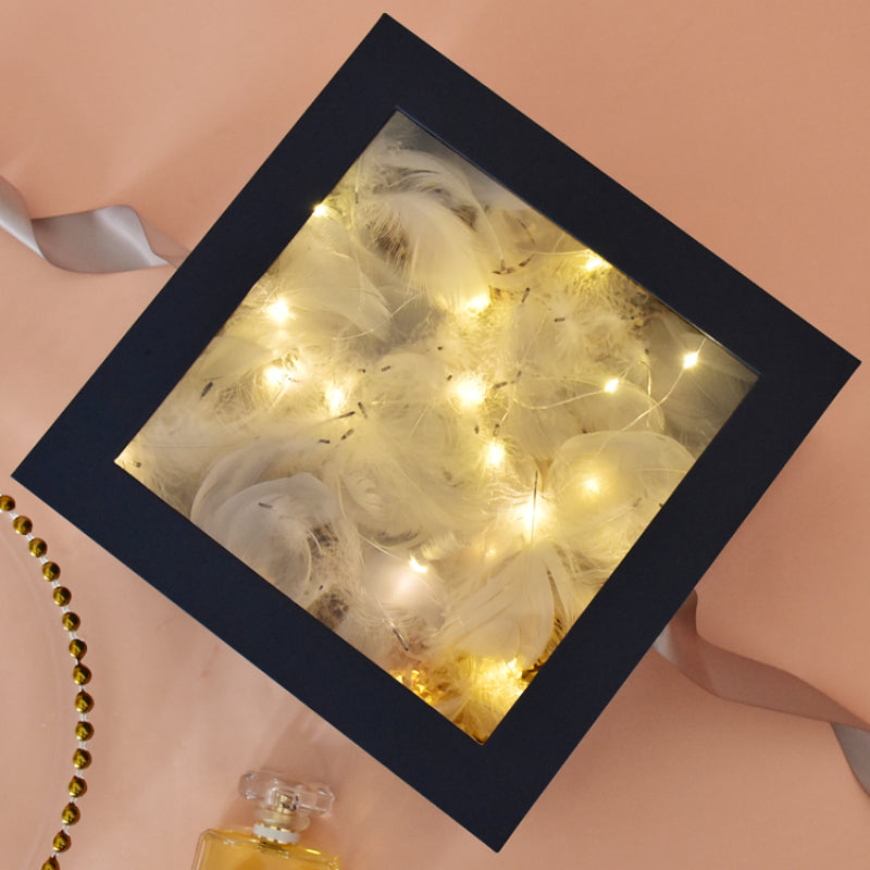 Boîte cadeau avec fenêtre transparente et ruban