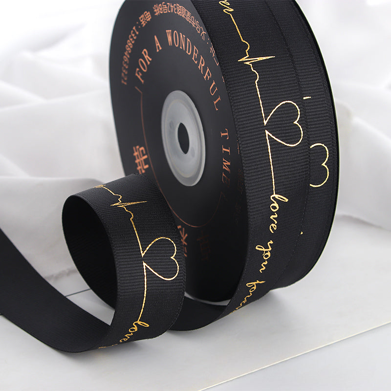 Ruban de battement de cœur estampé doré pour emballage de gâteau, pâtisserie, fleur, cadeau (2,5 cm x 45 mètres)