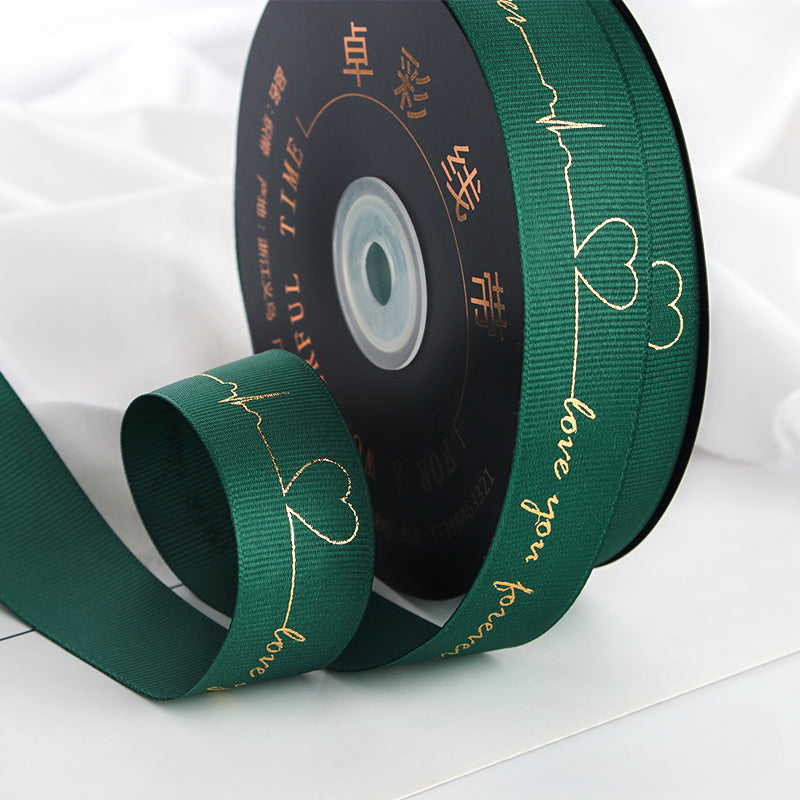 Ruban de battement de cœur estampé doré pour emballage de gâteau, pâtisserie, fleur, cadeau (2,5 cm x 45 mètres)