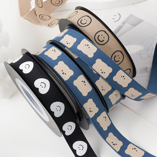 Ruban d'ours de dessin animé, ruban d'amour souriant, ruban d'emballage de boîte-cadeau de bouquet