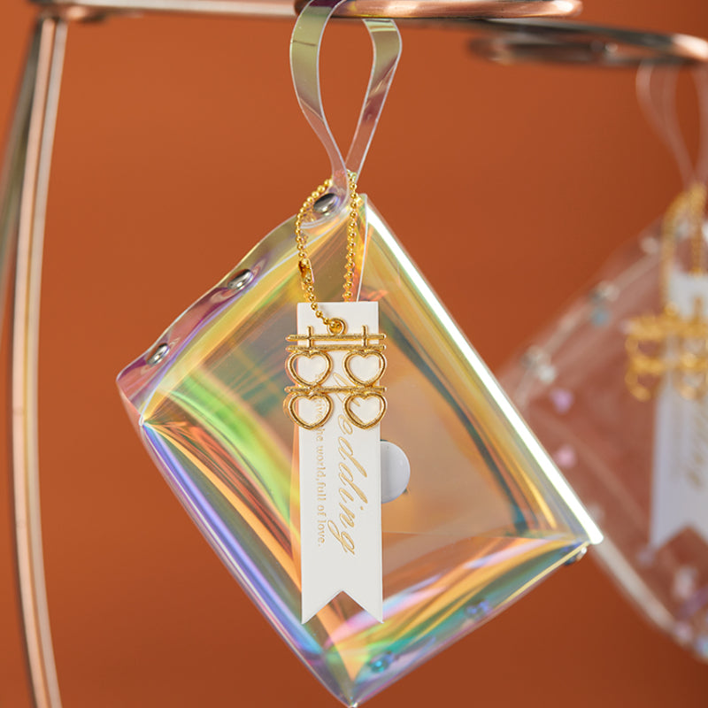 حقيبة هدايا شفافة عاكسة ملونة مقاومة للماء مصنوعة من مادة البولي فينيل كلوريد بالليزر وحقيبة سكر للزفاف