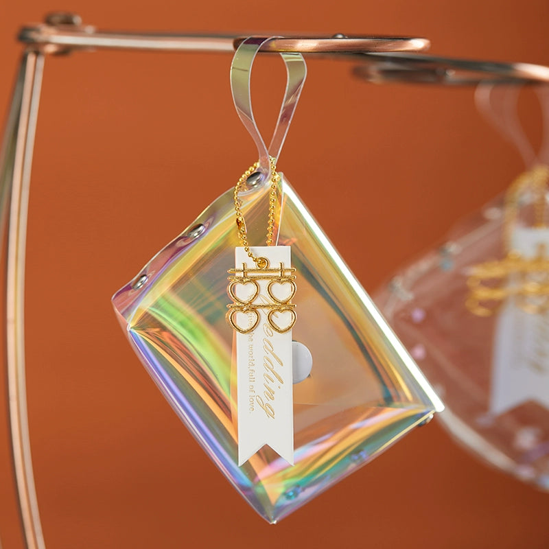 حقيبة هدايا شفافة عاكسة ملونة مقاومة للماء مصنوعة من مادة البولي فينيل كلوريد بالليزر وحقيبة سكر للزفاف