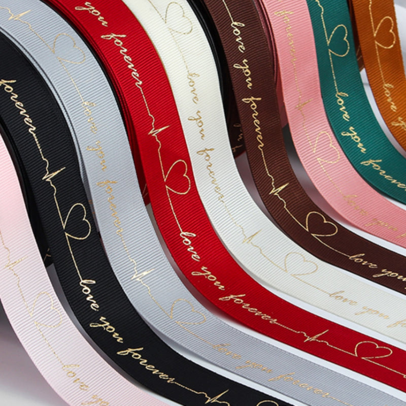 Ruban de battement de cœur estampé doré pour emballage de gâteau, pâtisserie, fleur, cadeau (2,5 cm x 45 mètres)