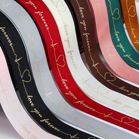 Ruban de battement de cœur estampé doré pour emballage de gâteau, pâtisserie, fleur, cadeau (2,5 cm x 45 mètres)