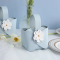 Fleurs bleues + blanches